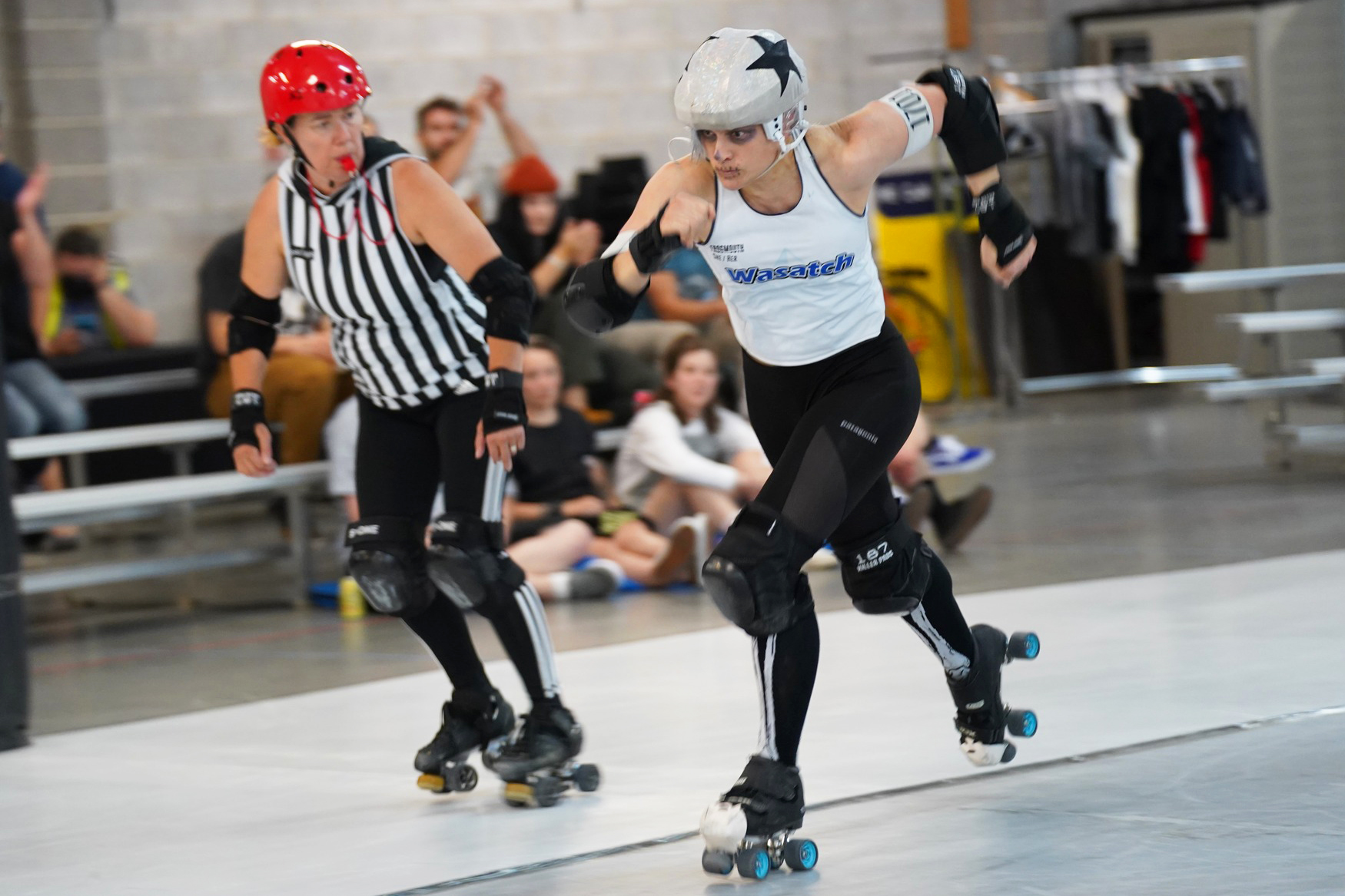 WRD skater Skelly Tore Us jams during a travel team bout against Pikes Peak.